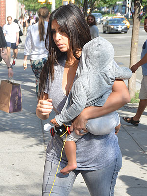 Kim Kardashian and Kanye West have unbelievably got their tot her very own stylist [Wenn]