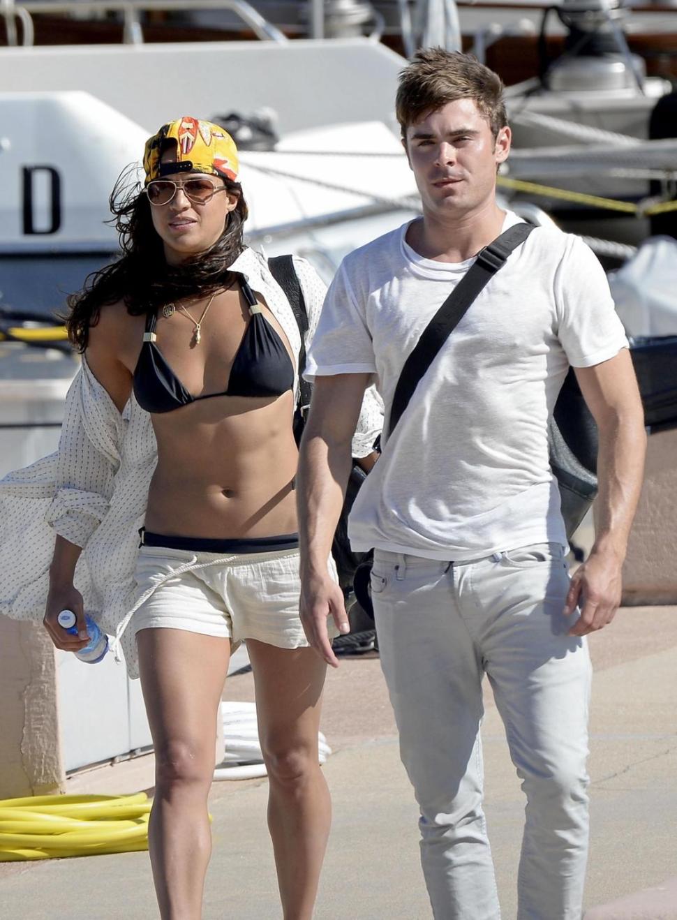 The hookup is apparently over for Michelle Rodriguez (l.) and Zac Efron, though a source claims he still wants to date the ‘Fast & Furious’ actress.