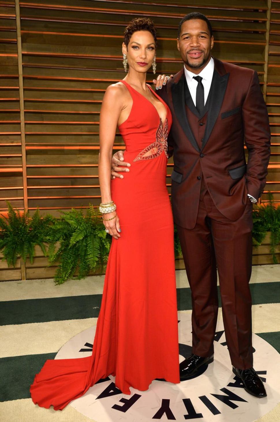 Nicole Murphy and Michael Strahan attend the 2014 Vanity Fair Oscar Party in March.