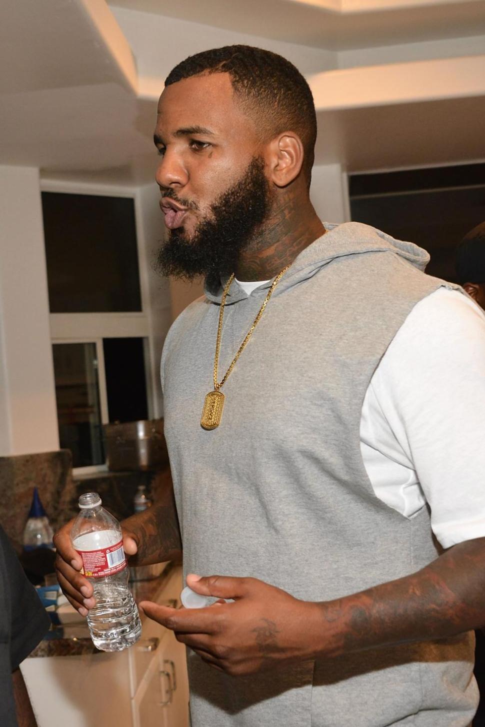 The Game, born Jayceon Terrell Taylor, was reportedly denied entry into Chris Brown’s pre-VMAs party at 1OAK. But photos appear to show him at the party on Aug. 23 in Los Angeles.