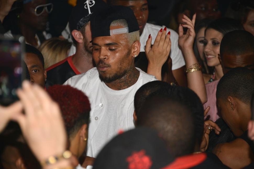 Chris Brown enjoyed his pre-VMAs party at 1OAK in West Hollywood on Aug. 23 before shots rang out reportedly injuring three, including Suge Knight. The shots were said to be targeting Brown.