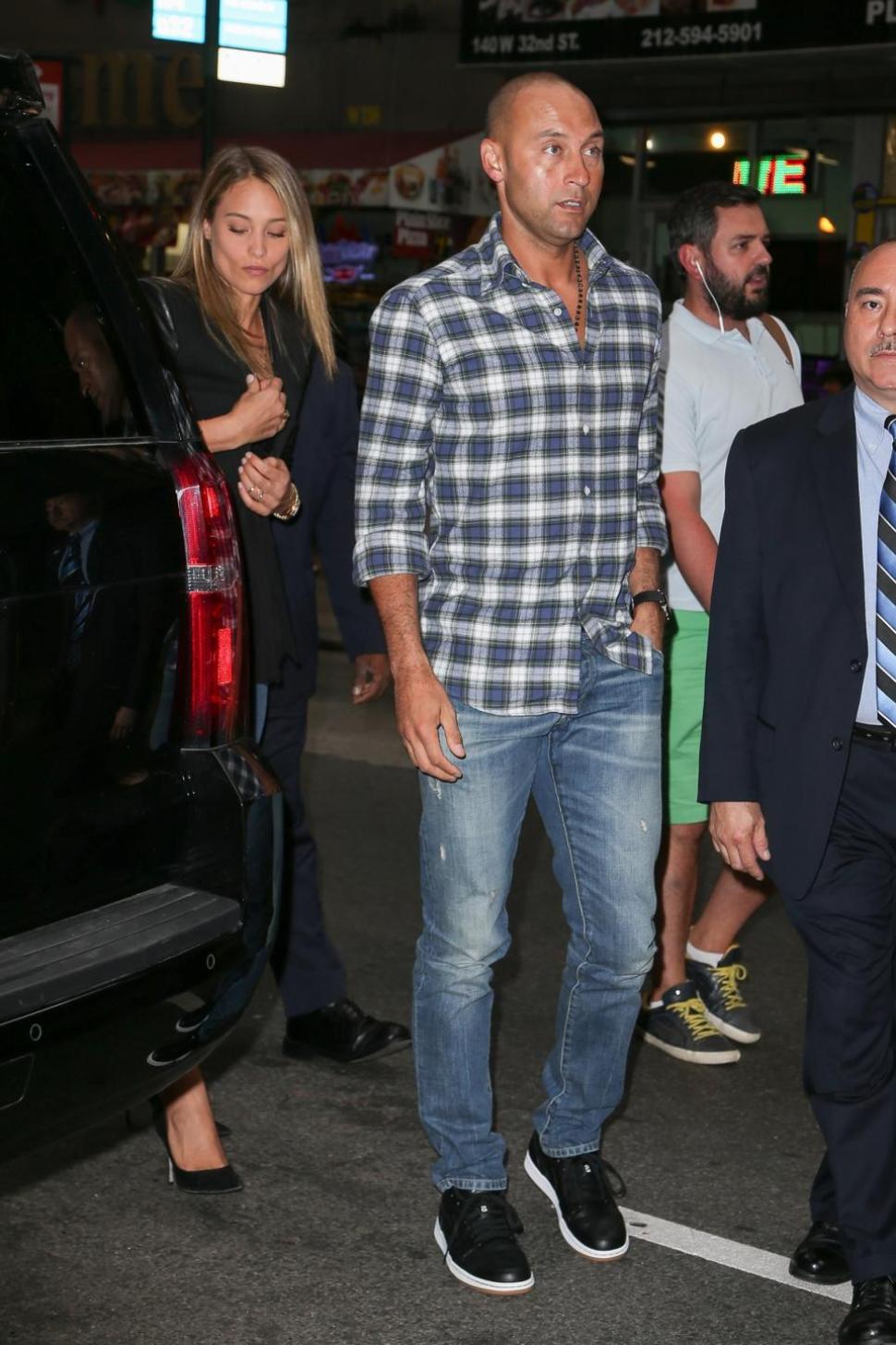Derek Jeter and girlfriend Hannah Davis, above, took in the Nike/Levi show for Fashion Week.
