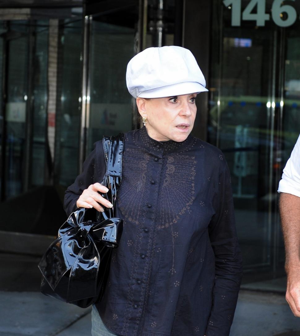Cindy Adams comes to see her friend Joan Rivers. When asked by the photographer how Joan Rivers was, she repleid,'Shes fine.'