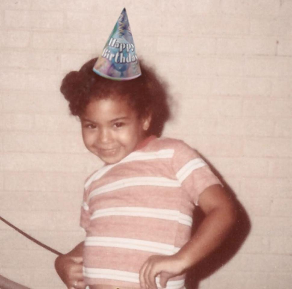 Beyonce posts a photo of herself as a kid and video of a birthday cake to celebrate her 33rd birthday on September 4, 2014.