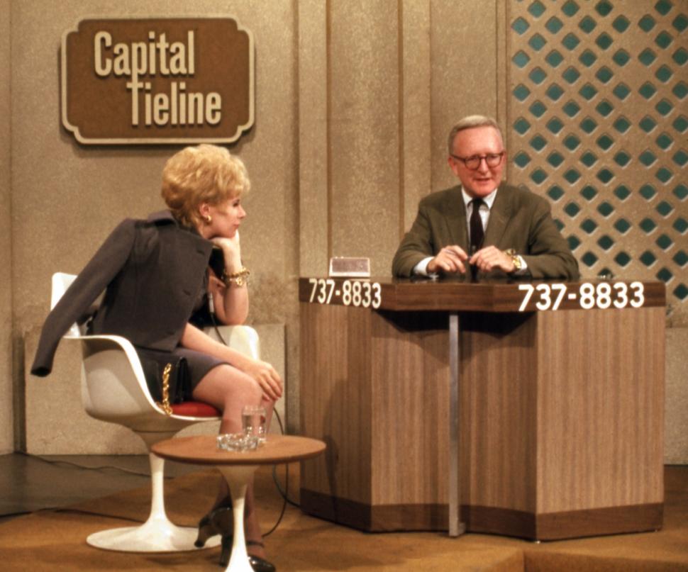 Host Mac McGarry interviews Joan Rivers on the set of the 'Capital Timeline' in 1968.