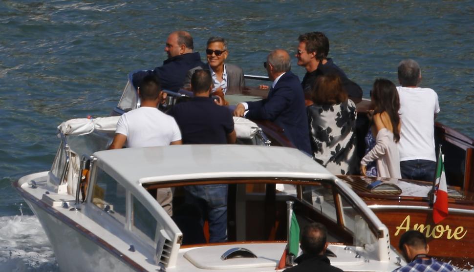 U.S. actor Miguel Ferrer (2nd R) arrives to take a water taxi catered privately for guests attending the wedding of U.S. actor George Clooney and his fiancee Amal Alamuddin in Venice September 26, 2014. Clooney, who has been dating Alamuddin since October 2013, has said the couple intend to host a large official wedding ceremony in Venice in late September. REUTERS/Alessandro Bianchi (ITALY - Tags: ENTERTAINMENT)