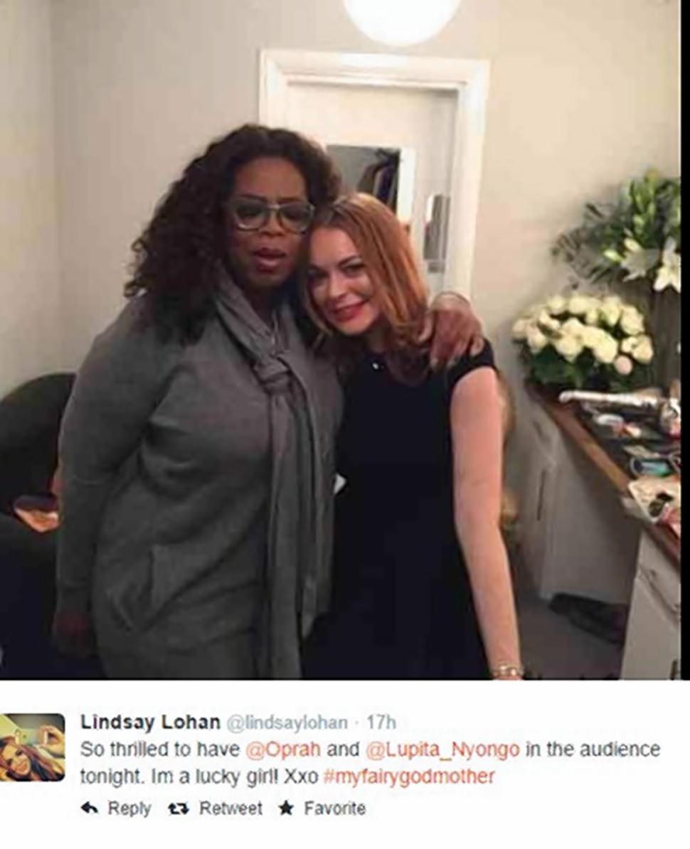 Oprah visits Lindsay Lohan backstage in London.