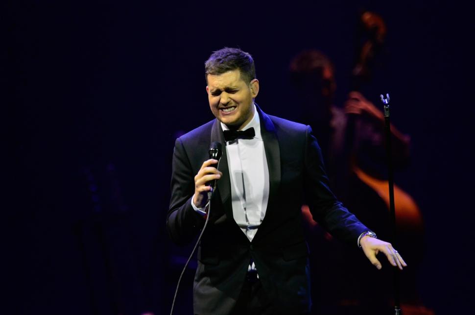 Michael Bublé, above, will be Christmas-ing with Ariana Grande in his Radio City special this year.