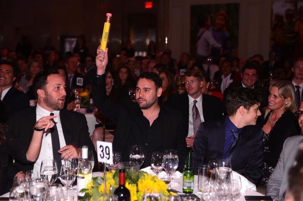 Scooter Braun (c.) attends the Fourth Annual Pencils Of Promise Gala at Cipriani Wall Street on Oct. 22.