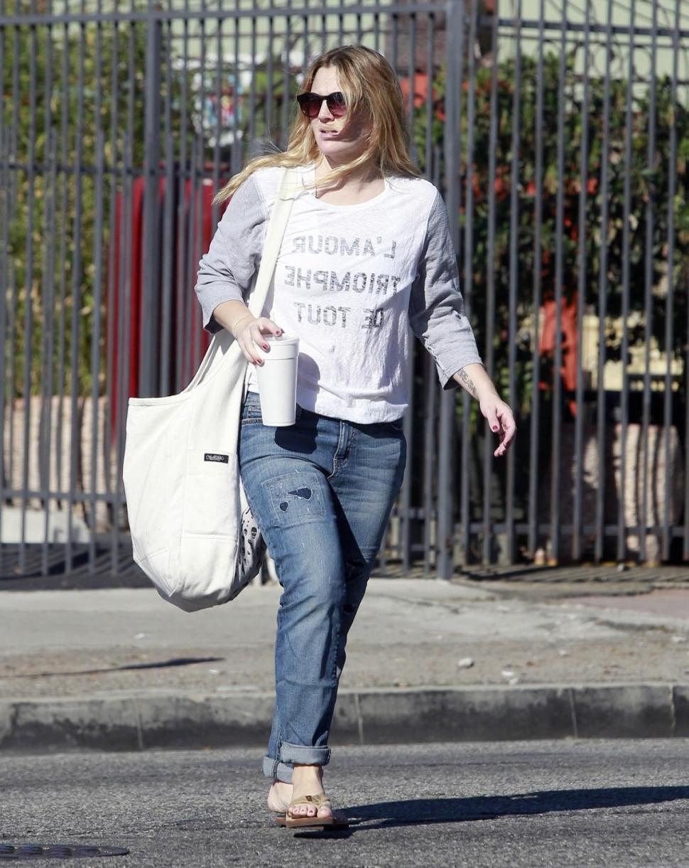 'Blended' actress Drew Barrymore is seen before slapped with a jaywalking ticket while leaving a yoga class in Los Angeles on Thursday.