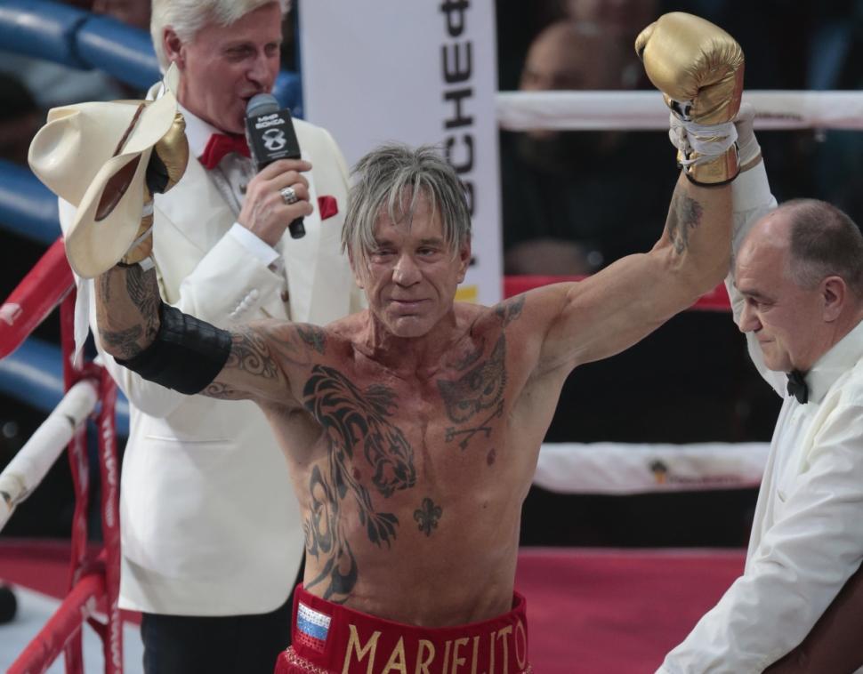  Rourke celebrating his second-round victory. It was the first time he stepped into the ring in 20 years.