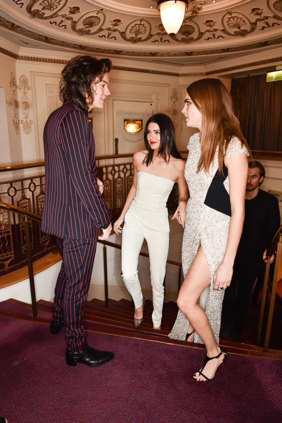 Harry Styles was photographed running into his rumored ex flames Kendall Jenner and Cara Delevingne at Monday's British Fashion Awards.