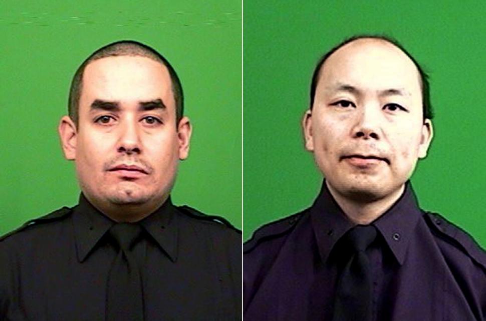 Police officers Rafael Ramos (l.) and Wenjian Liu (r.) who were assasinated while sitting in patrol car in Brooklyn on Dec. 20, 2014.