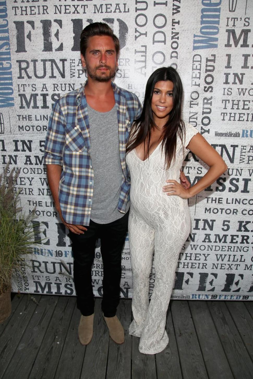Kourtney Kardashian and boyfriend Scott Disick attend Women's Health Hosts Hamptons ‘Party Under The Stars’ on August 9 in Bridgehampton, New York. The couple welcomed their third child on Sunday.