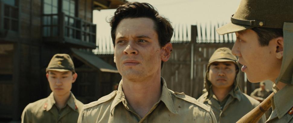 Jack O’Connell as Louis Zamperini in “Unbroken,” based on Laura Hillebrand’s book.