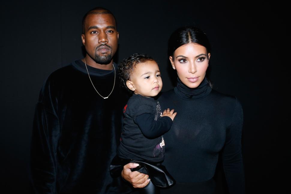 West, Kardashian attend the Balenciaga show along with their daughter North West in September.