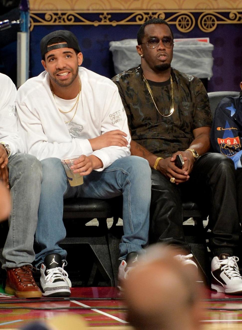 Drake (L) and mogul Sean (Diddy) Combs are reportedly at odds after a brawl broke out early Monday over a snide comment by Drake.