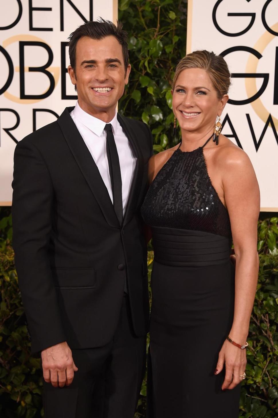Jennifer Aniston (r.) and fiance Justin Theroux at the 2015 Golden Globes.