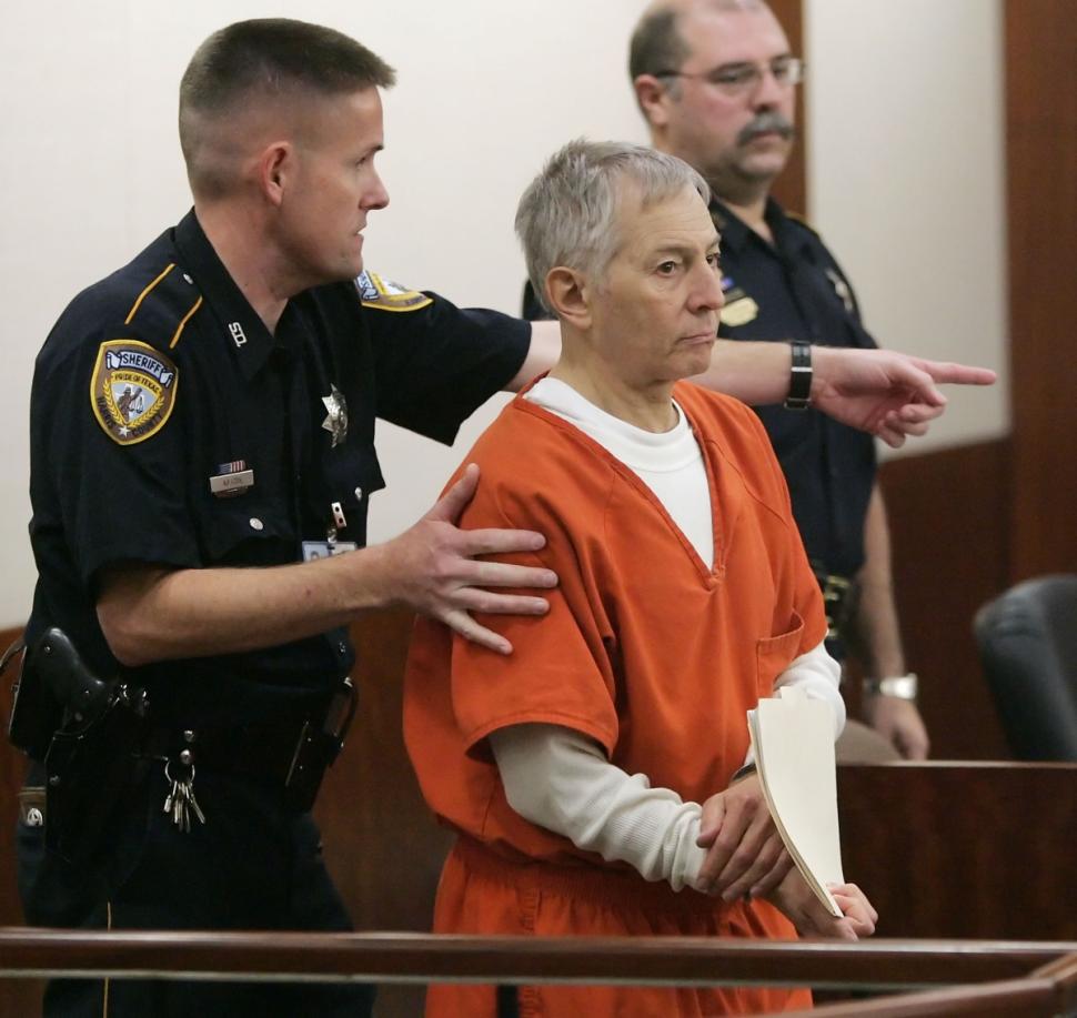 Robert Durst is escorted into a Houston courtroom for a parole revocation hearing in January 2006. Durst was acquitted earlier of murdering his Galveston neighbor.