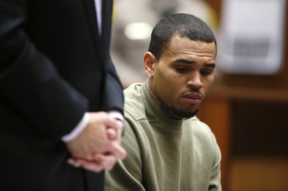 Chris Brown appeared in Los Angeles County Superior court with on-again girlfriend Karrueche Tran and looked glum as Judge James Brandlin said he was still 202 hours short of the 1,000 community labor hours he agreed to serve.
