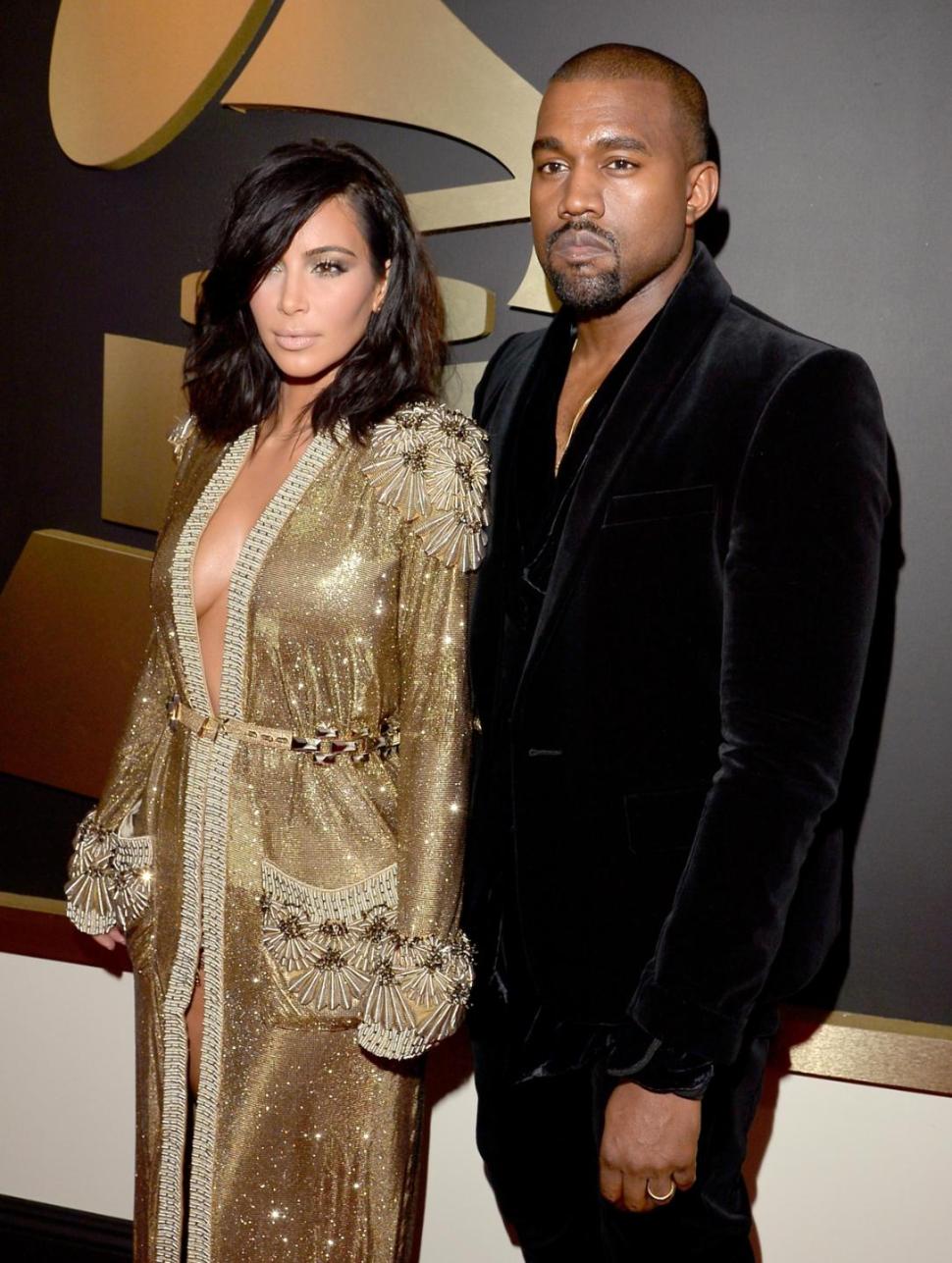 Kim Kardashian and Kanye West attend the 57th Annual Grammy Awards at the Staples Center Sunday in Los Angeles.