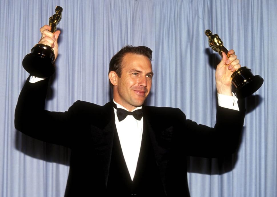 Kevin Costner built a table from a couple of brass doors he bought from the Empire State Building, and made a unique display case for the trophies he won for 'Dances With Wolves,' but when he moved to a new house, their location changed as well.