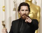 ** EMBARGOED AT THE REQUEST OF THE ACADEMY OF MOTION PICTURE ARTS & SCIENCES FOR USE UPON CONCLUSION OF THE ACADEMY AWARDS TELECAST **Christian Bale poses backstage with the Oscar for best performance by an actor in a supporting role for "The Fighter" at the 83rd Academy Awards on Sunday, Feb. 27, 2011, in the Hollywood section of Los Angeles. (AP Photo/Matt Sayles)