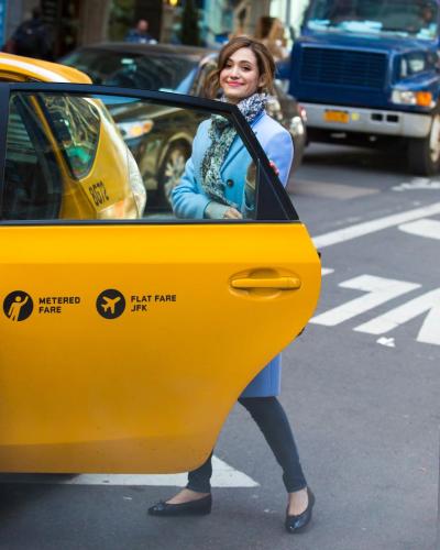 Emmy Rossum is just another New Yorker hailing a cab. 