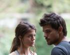 Marie Avgeropoulos and Taylor Lautner in “Tracers”