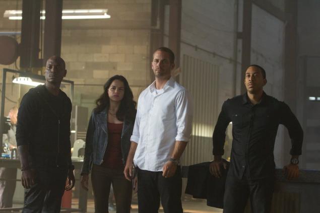 Michelle Rodriguez (2nd from l.) says she had a tough time dealing with the death of her ‘Furious 7’ co-star, Paul Walker. Also pictured are Tyrese Gibson and Chris ‘Ludacris’ Bridges.