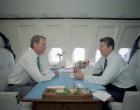James Baker and President Reagan meet aboard Air Force One during a trip to Chicago on April 15, 1982.