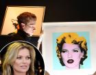 LONDON, ENGLAND - MARCH 23: Employees George Foren (L) and Matthew Fancy hold Banksy's 'Kate Moss 2005' at Bonhams on March 23, 2012 in London, England. The painting, estimated at GBP 30,000 - 50,000, USD 48,000 - 79,000, 35,000 - 59,000 euros forms part of the Urban Art Sale, which takes place at Bonhams on March 29, 2012. (Photo by Peter Macdiarmid/Getty Images)