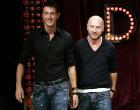 Fashion designers Domenico Dolce, right, and Stefano Gabbana acknowledge the applause of the audience after presenting their D&G Fall/Winter 2005/2006 fashion collection, in Milan, Italy, Wednesday, Feb. 23, 2005. (AP Photo/Luca Bruno)