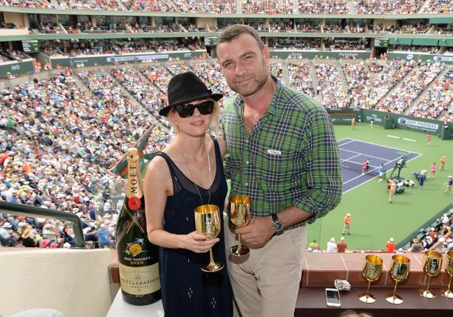 Naomi Watts and Liev Schreiber stay hydrated in the desert at the Moet and Chandon Suite.