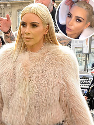 Kim Kardashian gets her hair done again [Splash/Instagram]