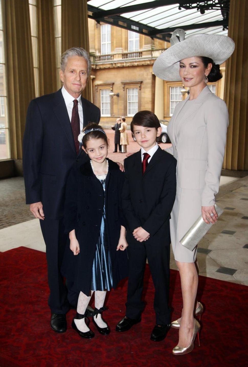 Michael Douglas, seen here in 2011, opened up in an op-ed piece about an anti-Semitic attack on his son Dylan (2nd from right) while on a family vacation with wife Catherine Zeta-Jones.