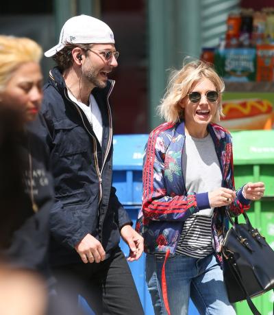 Bradley Cooper and Sienna Miller check out the SoHo scene.