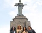 Kim and Khloe Kardashian pose with their cousins at Statue of Armenia in Armenia.