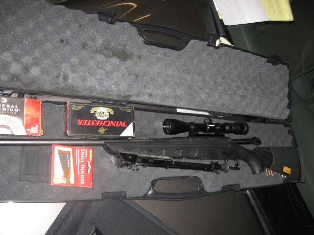 Photos of guns and license plates found in the rental car of Florida private investigator Dwayne Powell, 42.