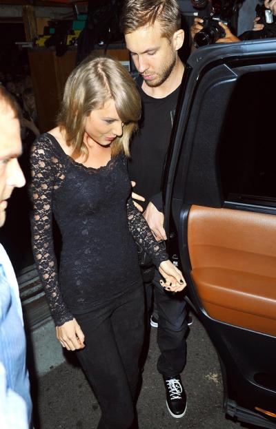 Taylor Swift and rumored boyfriend Calvin Harris spotted holding hands after watching the band Haim perform at Troubadour Club in West Hollywood, Calif.