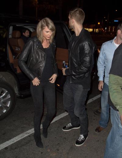 Taylor Swift and Calvin Harris arrive at the Troubadour in West Hollywood to attend a concert Thursday in Los Angeles, Calif.