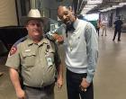 Texas Department of Public Safety Trooper Billy Spears has been reprimanded for posing for a picture with rapper Snoop Dog durin the South by Southwest (SXSW) music festival in Austin.