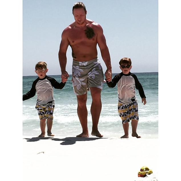 ‘Mini Kroys,’ Zolciak captioned this adorable Instagram photo of her husband and two of their sons.