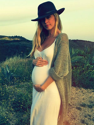 Brandon Jenner's wife Leah cradles her baby bump in series of intimate snaps [Instagram]