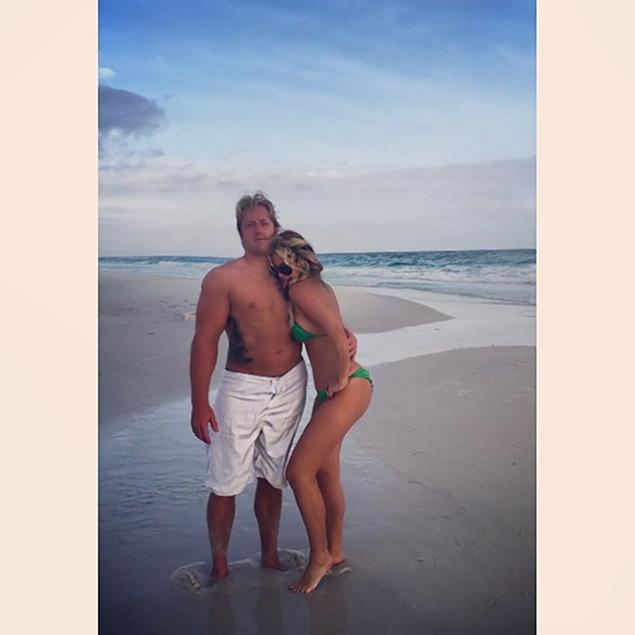 Kim Zolciak shared this vacation pic of her and her husband, Kroy Biermann, with the caption, "Lovin that salt on his chest!"
