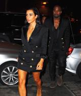 Kim Kardashian and Kanye West wear blue contact lenses on Instagram.