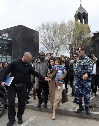 Kim Kardashian, husband Kanye West and their daughter North paid a visit to an Armenian church on Saturday.