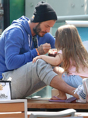 David Beckham and daughter Harper were as close as ever as they shared a sweet treat in LA [Splash]