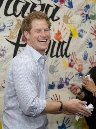 Prince Harry finds a sticky situation on a visit to a youth center in New Zealand.