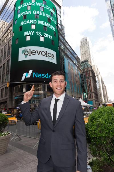 Things are looking up for Bryan Greenberg at the Nasdaq sign noting the Olevolos Project.